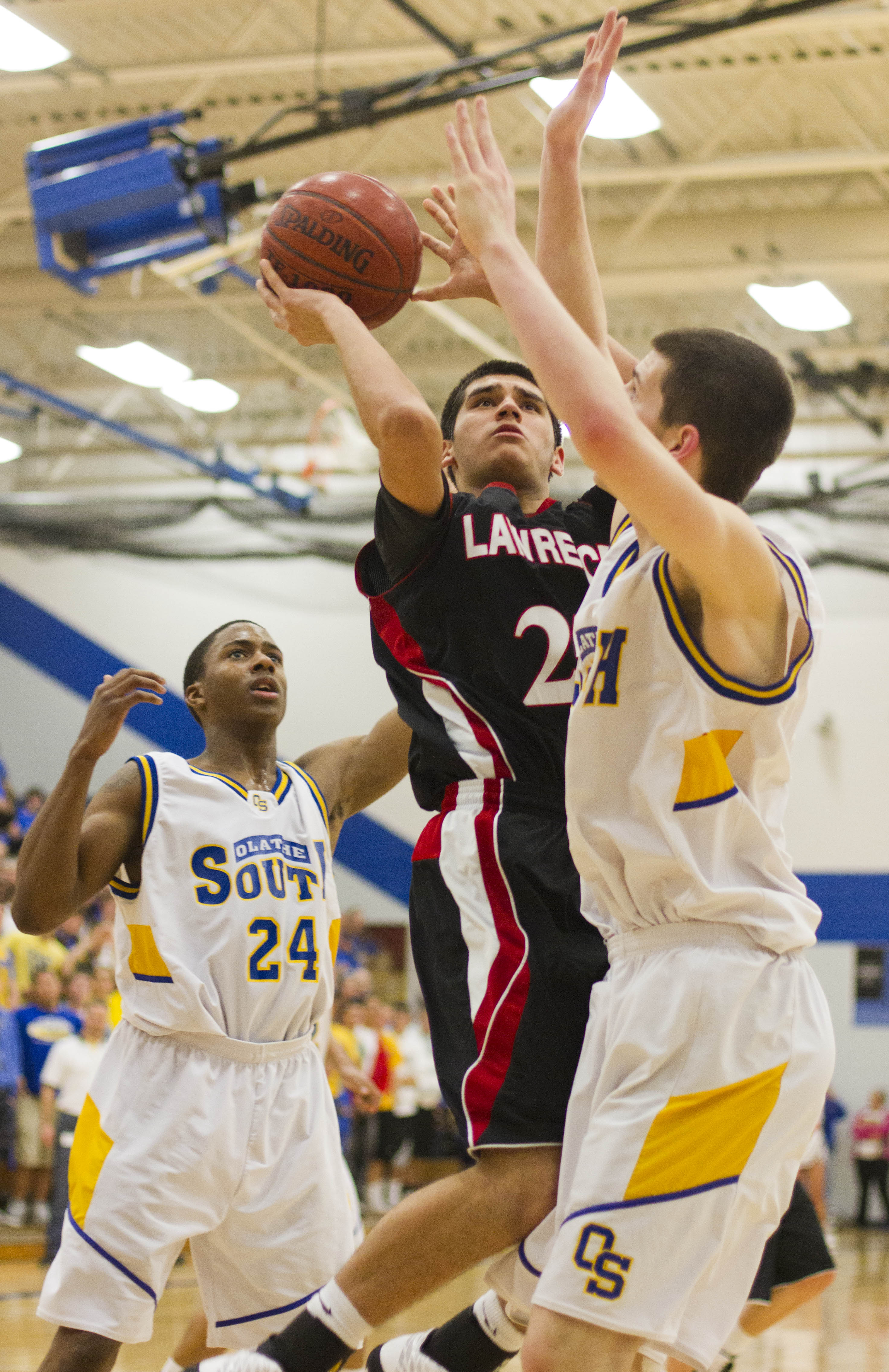 Lawrence High boys basketball stuns top-seeded Olathe South | News ...